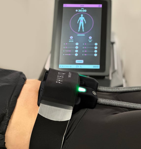 PHYSIQ 360 being used on womans abdomen